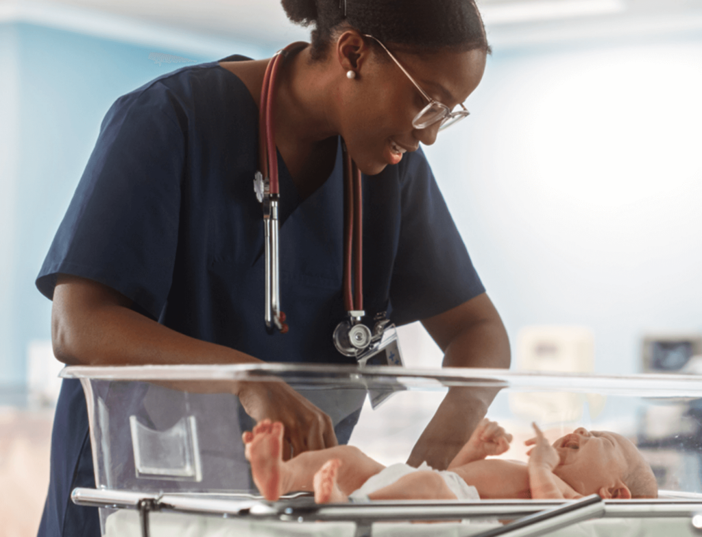 Nurse examine newborn baby